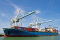 Container ship and loading cranes at the port of Miami. Royalty Free Stock Photo