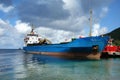 A container ship alongside the customs wharf in kingstown, st. vincent Royalty Free Stock Photo