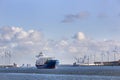 Container ship on canal Hartelkanaal in Rotterdam