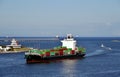 Container ship with cargo entering port of Kaohsiung, Taiwan. Royalty Free Stock Photo