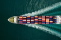 Container ship carrying cargo boxes, global trade and logistics concept Royalty Free Stock Photo