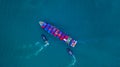 Container ship carrying container for import and export, business logistic and transportation by ship in open sea, Aerial view Royalty Free Stock Photo