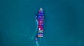 Container ship carrying container for import and export, business logistic and transportation by ship in open sea, Aerial view Royalty Free Stock Photo