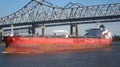 Container Ship Crossing Under Crescent City Connection Bridge on the Mississippi River Royalty Free Stock Photo