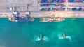 Container ship in export and import business and logistics. Shipping cargo to harbor by crane. Water transport International. Royalty Free Stock Photo