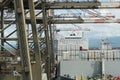 Container ship fully loaded with white reefer containers during cargo operation.