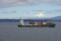 Container ship heading along the coast of Patagonia, Chile.