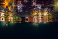 Container ship loading and unloading in deep sea port, Aerial view at night Royalty Free Stock Photo