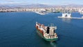 Aerial view of container ship approaching to the port of Alicante, Spain. Royalty Free Stock Photo