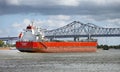 Ship under New Orleans bridge Royalty Free Stock Photo