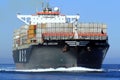 Big container ship MSC ABIDJAN sailing in open waters.