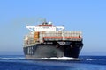 Big container ship MSC ABIDJAN sailing in open waters. Royalty Free Stock Photo
