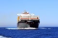 Big container ship MSC ABIDJAN sailing in open waters. Royalty Free Stock Photo