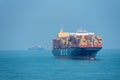 Container ship `MSC Josseline` sailing through calm blue ocean. Royalty Free Stock Photo