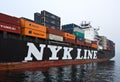 Container ship NYK Meteor standing on the roads at anchor. Nakhodka Bay. East (Japan) Sea. 09.04.2014 Royalty Free Stock Photo