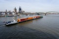 container ship with a push barge passes through cologne