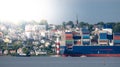 Container ship on the river Elbe in front of the district Blankenese in Hamburg, Germany Royalty Free Stock Photo