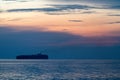 Container ship sail along the trade route in the evening before