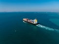 container ship sailing full speed with beautiful wave pattern line, cargo logistic and transportation import export of Royalty Free Stock Photo
