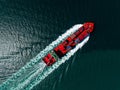 container ship sailing full speed with beautiful wave pattern line, cargo logistic and transportation import export of Royalty Free Stock Photo