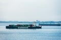 Container ship sailing through Singapore Strait. Royalty Free Stock Photo
