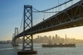 Container ship sails along San Francisco Bay at sunset Royalty Free Stock Photo