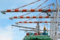 Container Ship in terminal working with shore crane at dock Royalty Free Stock Photo