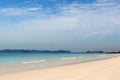 Container shipping by the sea. Sand beach tropical summer background. Cargo ship.