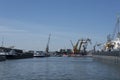 Container ships moored at a container terminal in the Port of Rotterdam. The port is the Europ`s largest and facilitate