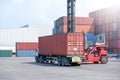 Container handlers are loading containers into trucks Royalty Free Stock Photo