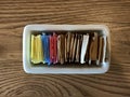 Container of sugar nd sugar substitute packets on a restaurant table Royalty Free Stock Photo
