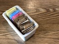Container of sugar nd sugar substitute packets on a restaurant table Royalty Free Stock Photo