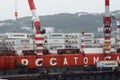 Container terminal commercial sea port, unloaded container ship Sevmorput - Russian nuclear-powered icebreaker lighter aboard ship