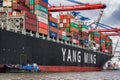 Container terminal and huge container ship in the Port of Hamburg Royalty Free Stock Photo