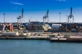 Container terminal, cargo port. Container loading cranes. Royalty Free Stock Photo