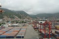 Container terminal in the Port of La Guaira observed from cargo ship moored below gantry cranes. Royalty Free Stock Photo