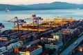 Container terminal in Vladivostkoye against the background of the sea.