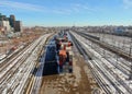 Container transport by rail. Aerial view panorama of a major railway station in the big city.