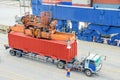 Container truck waiting for loading container box to Cargo ship Royalty Free Stock Photo