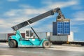 Container unloading truck in logistics yard., Business transpotation. Royalty Free Stock Photo