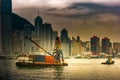 Container vessel and a small tug boat - mooring operations in Hong Kong