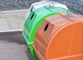 Containers in different colors to collect recyclable waste Royalty Free Stock Photo