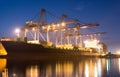 Containers loading by crane on morning dark Royalty Free Stock Photo