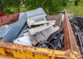 Containers with metal scrap on the recyclable material Royalty Free Stock Photo