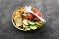 Containers for the preparation of healthy food with brown rice, fried cheese halumi, tomatoes, cucumbers, pine nuts. Top Royalty Free Stock Photo