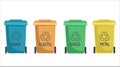 Containers or recycle bins for paper, plastic, glass and metal trash. Concept of separate garbage collection. Dumpsters