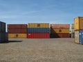 Containers stacked on a harbor wait to be shipped worldwide at port