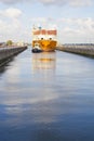 Containership entering the sea lock at Velsen, The Netherlands