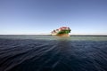 Containership Hamburg stuck on Woodhouse reef. Royalty Free Stock Photo