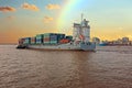Containership on the Yangon river near Yangon in Myanmar Royalty Free Stock Photo